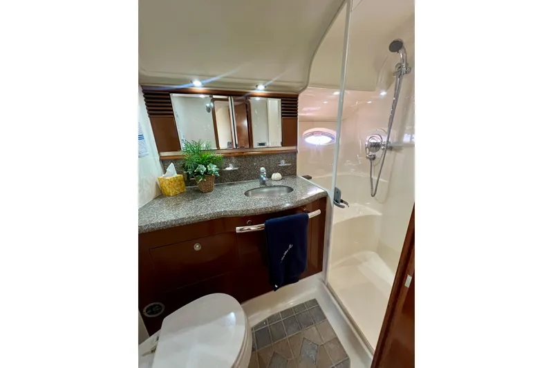 Slide: The Image of Luxurious bathroom in 2005 Sea Ray 500 Sundancer yacht with shower and vanity. - 21