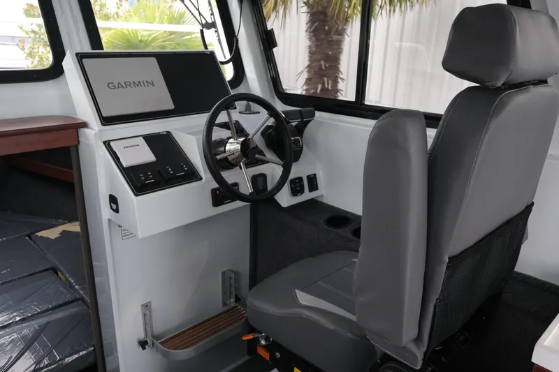 Slide: The Image of Interior of 2026 Hewescraft 270 Pacific Explorer with Garmin navigation system. - 10