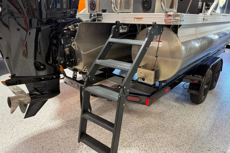 Slide: The Image of 2024 Barletta Cabrio C22UC pontoon boat interior with plush seating and modern design. - 11