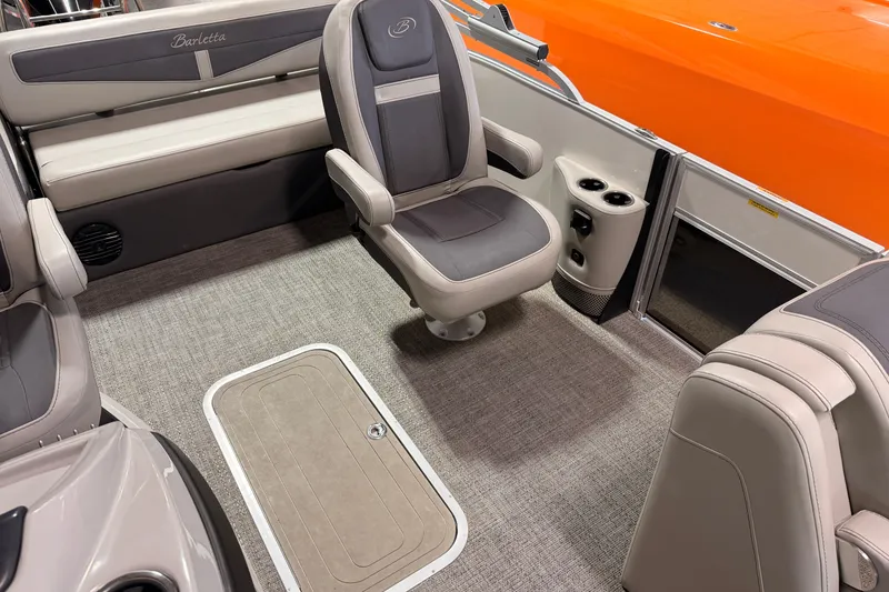 Slide: The Image of 2024 Barletta Cabrio C22UC pontoon boat, side and top view, showcasing sleek design and spacious layout. - 26