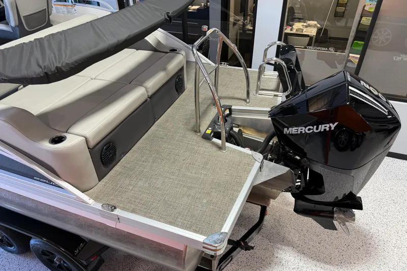 Slide: The Image of 2024 Barletta Cabrio C22UC pontoon boat on trailer in showroom. - 5