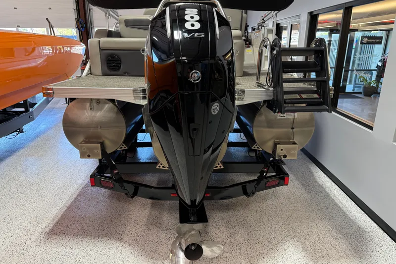 Slide: The Image of 2024 Barletta Cabrio C22UC pontoon boat interior with luxurious seating and modern design. - 7