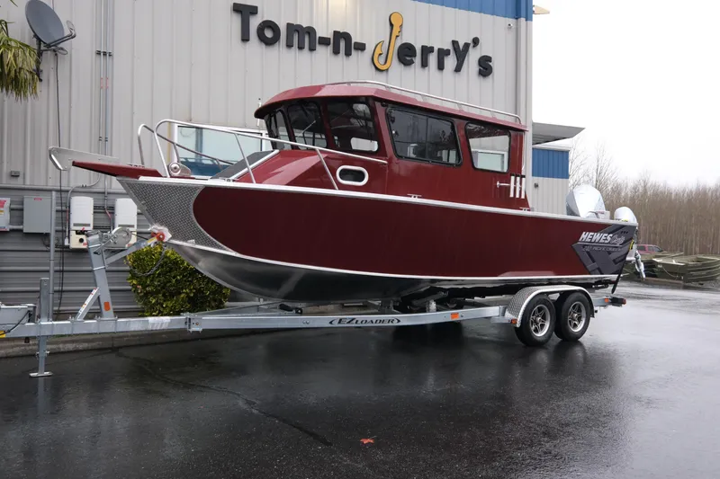 The Image of 2026 Hewescraft 240 Pacific Cruiser boat on trailer at Tom-n-Jerry's dealership. - 1