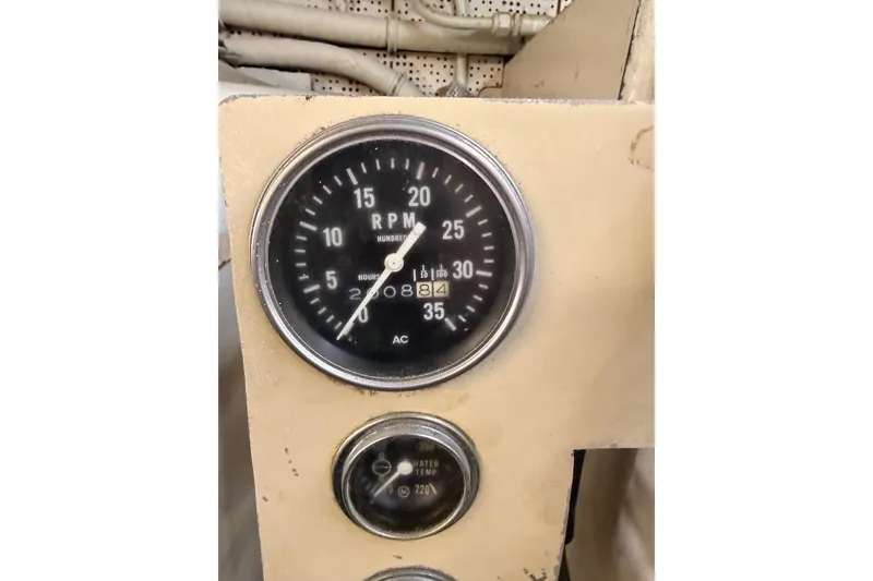 Slide: The Image of RPM gauge on 1984 Hartman-Palmer 60 Flush Deck Motor Yacht dashboard. - 6