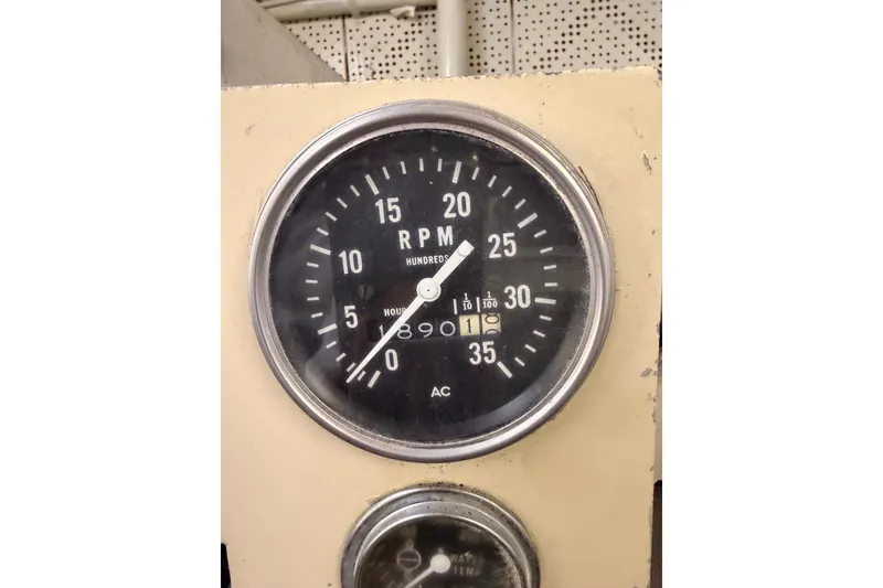 Slide: The Image of RPM gauge on 1984 Hartman-Palmer 60 Flush Deck Motor Yacht dashboard. - 7