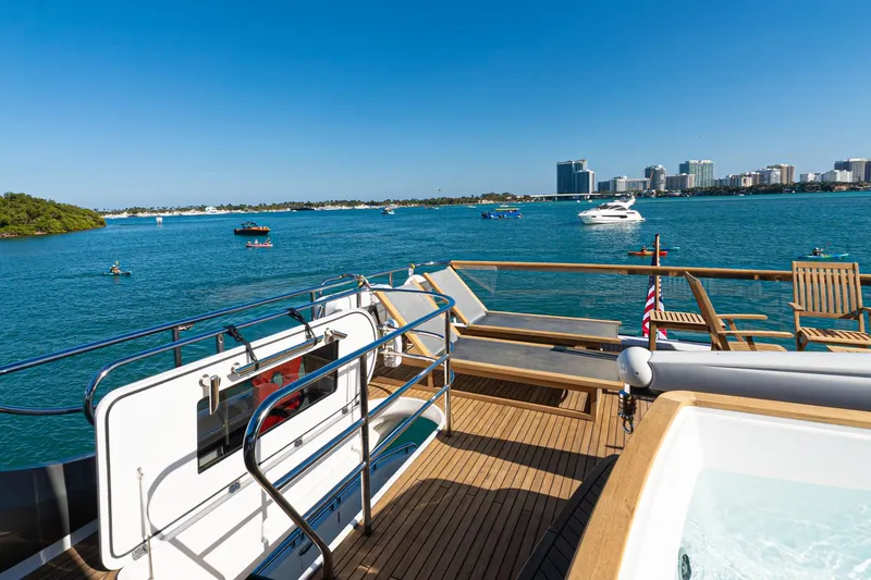Slide: The Image of Luxurious 2022 Princess Y85 yacht deck with ocean view and city skyline. - 24