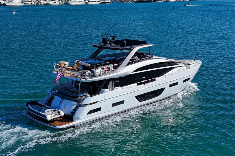 Slide: The Image of Luxurious 2022 Princess Y85 yacht cruising on clear blue waters. - 3