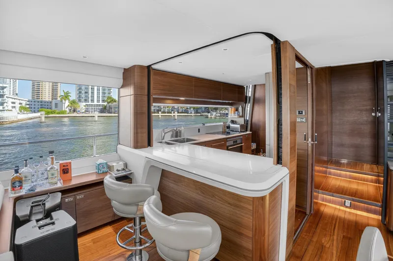 Slide: The Image of Luxurious 2022 Princess Y85 yacht interior with modern kitchen and waterfront view. - 36