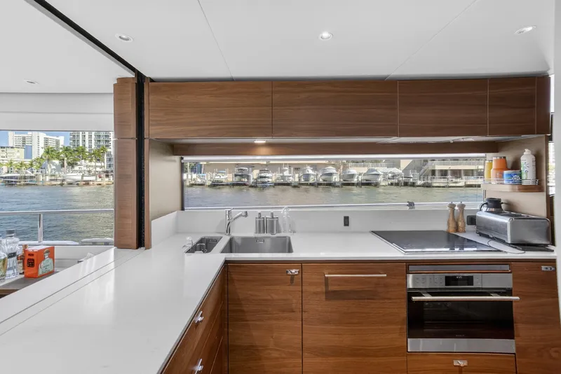 Slide: The Image of Luxurious 2022 Princess Y85 yacht kitchen with modern appliances and waterfront view. - 37