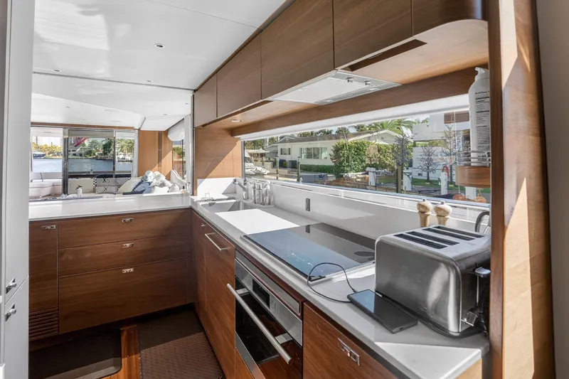 Slide: The Image of Luxurious kitchen interior of 2022 Princess Y85 yacht with modern appliances and sleek design. - 39