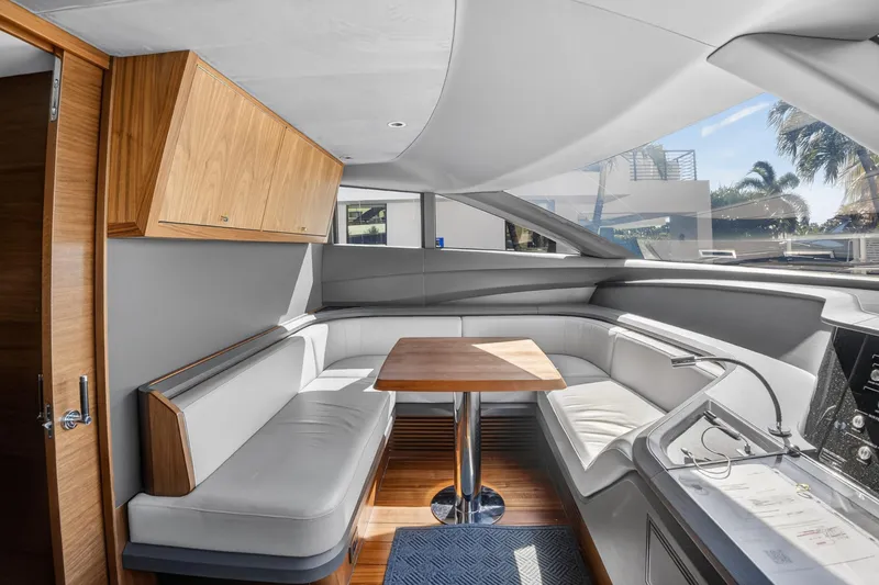 Slide: The Image of Luxurious interior of 2022 Princess Y85 yacht with sleek seating and wooden accents. - 41