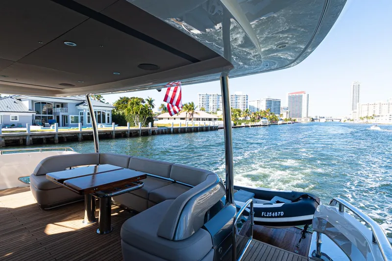 Slide: The Image of Luxurious 2022 Princess Y85 yacht cruising with scenic waterfront views. - 45