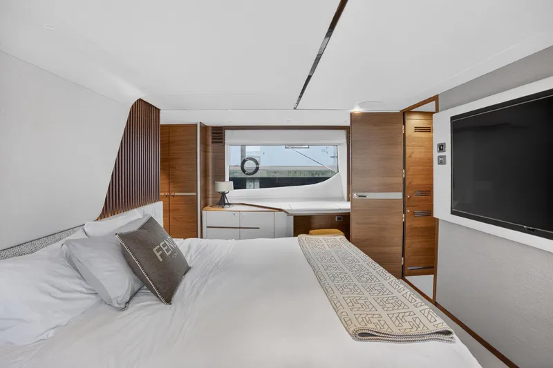 Slide: The Image of Luxurious bedroom interior of 2022 Princess Y85 yacht with modern design and elegant furnishings. - 48