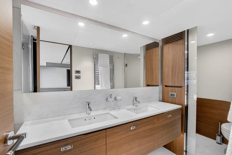 Slide: The Image of Luxurious bathroom interior on 2022 Princess Y85 yacht, featuring dual sinks and modern design. - 51