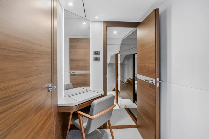 Slide: The Image of Luxurious interior of 2022 Princess Y85 yacht with modern wood finishes and elegant design. - 53