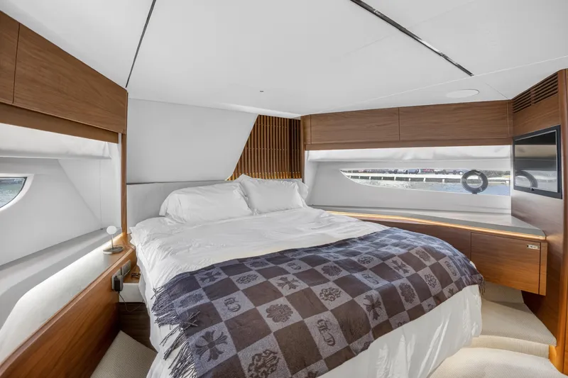 Slide: The Image of Luxurious bedroom interior of 2022 Princess Y85 yacht with modern design and elegant furnishings. - 57