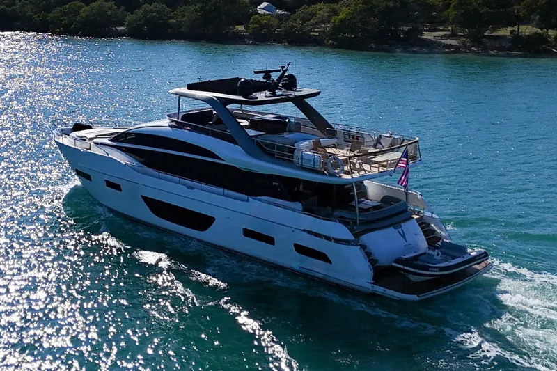 Slide: The Image of Luxurious 2022 Princess Y85 yacht cruising on sparkling blue waters. - 8