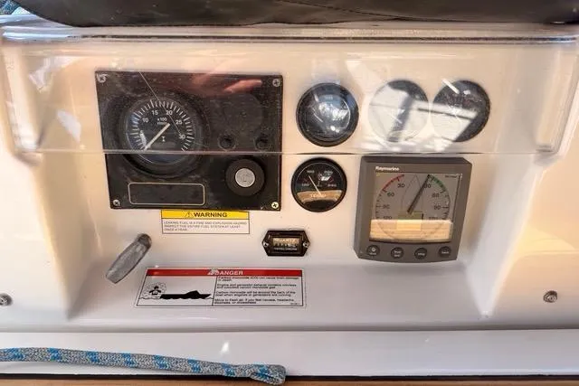 Slide: The Image of Control panel of a 2005 Beneteau Oceanis Clipper 423 sailboat with gauges and instruments. - 4