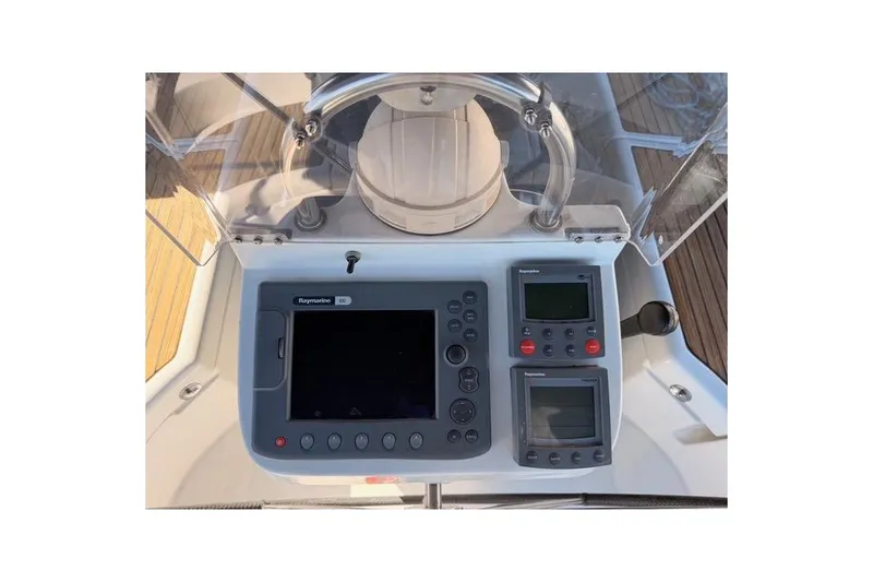 Slide: The Image of Control panel of 2005 Beneteau Oceanis Clipper 423 sailboat with navigation instruments. - 6