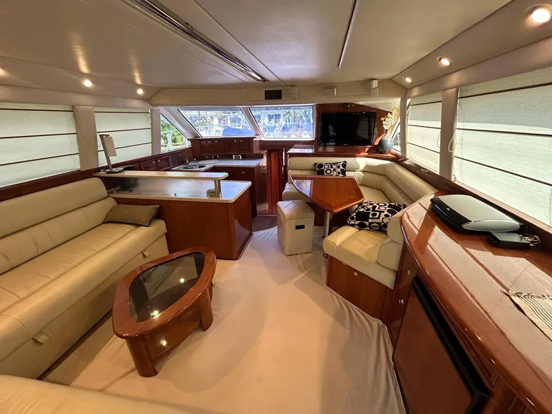 Slide: The Image of Luxurious interior of 2009 Riviera 47 Enclosed Flybridge. - 11