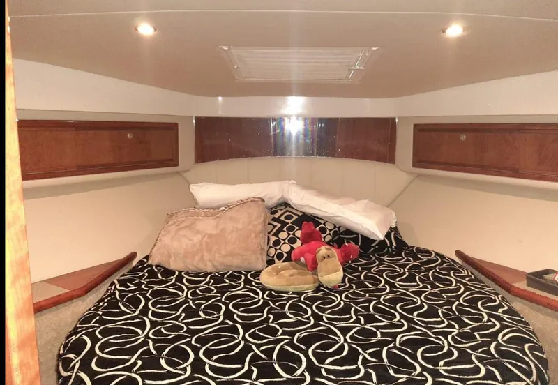 Slide: The Image of Luxurious cabin interior of 2009 Riviera 47 Enclosed Flybridge Series II yacht. - 35