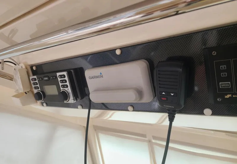 Slide: The Image of Control panel of 2009 Riviera 47 Enclosed Flybridge Series II with Garmin equipment. - 39