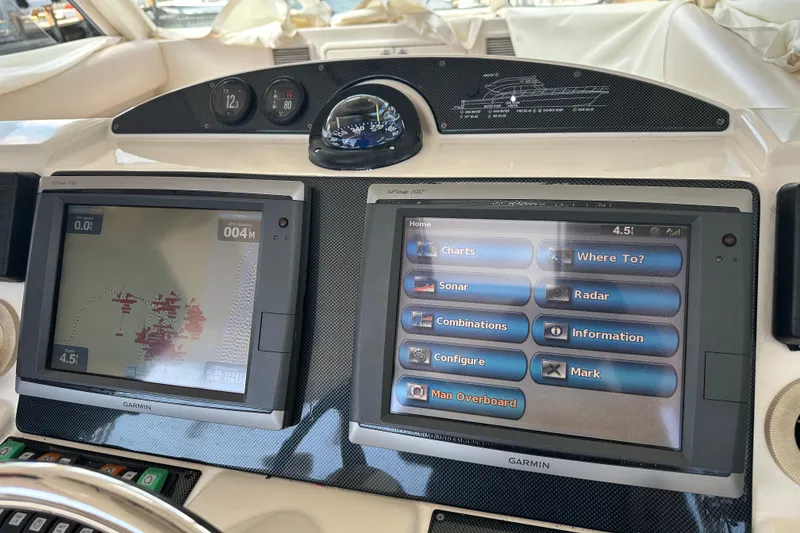 Slide: The Image of Navigation system on 2009 Riviera 47 Enclosed Flybridge Series II yacht dashboard. - 43