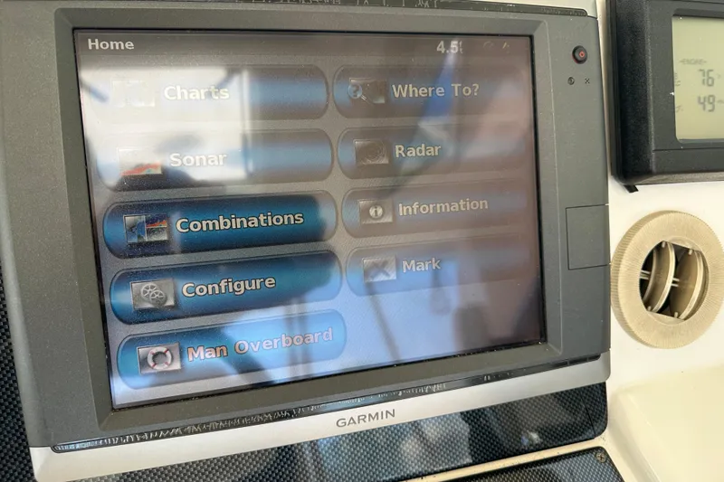 Slide: The Image of Garmin navigation display on 2009 Riviera 47 Enclosed Flybridge Series II yacht. - 47