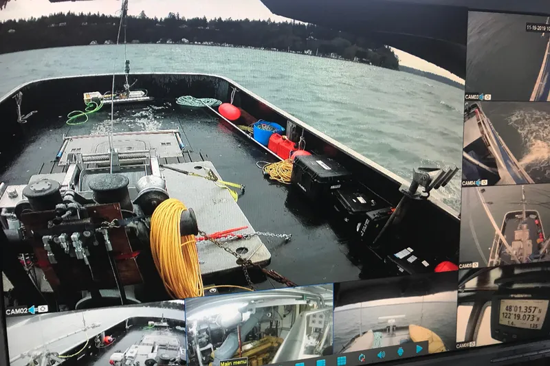 Slide: The Image of 1973 Custom 58’ Steel Marco Seiner on water, multiple camera views, fishing equipment visible. - 15