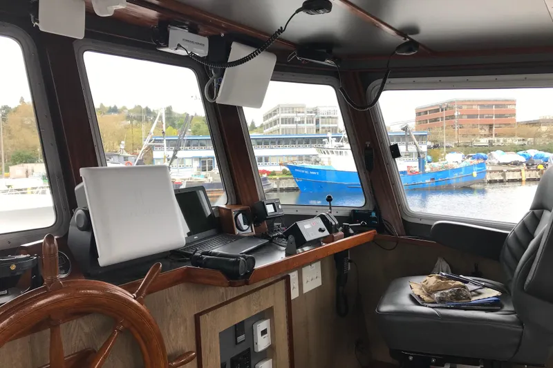 Slide: The Image of Interior of a 1973 Custom 58’ Steel Marco Seiner boat with navigation equipment. - 8