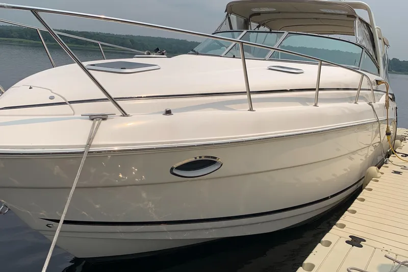 Slide: The Image of 2006 Rinker Fiesta Vee 300 boat at dock. - 18