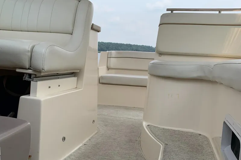 Slide: The Image of Interior of a 2006 Rinker Fiesta Vee 300 boat with seating. - 7