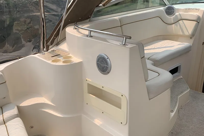 Slide: The Image of Interior of a 2006 Rinker Fiesta Vee 300 boat with seating area. - 4