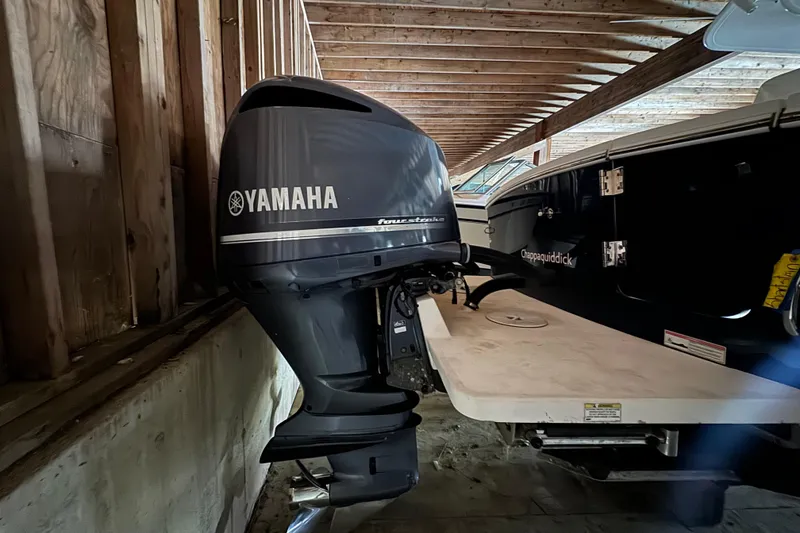 Slide: The Image of Yamaha outboard motor on a 2014 Regulator 28 boat. - 3