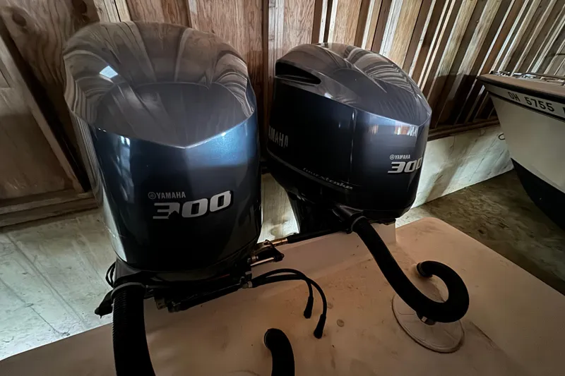 Slide: The Image of Two Yamaha 300 outboard motors on a 2014 Regulator 28 boat. - 4