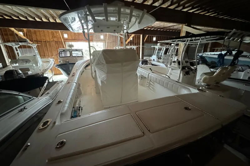 Slide: The Image of 2014 Regulator 28 boat in storage with other boats. - 5