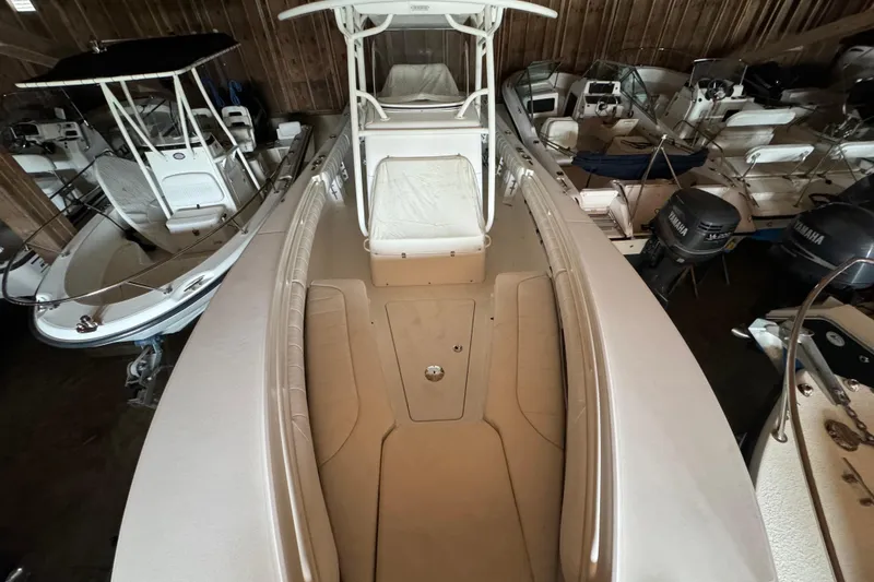 Slide: The Image of 2014 Regulator 28 boat in storage with other boats. - 7