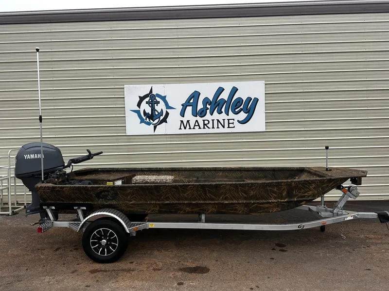 The Image of G3 Package Jon 16 FL boat in front of Ashley Marine building. - 1