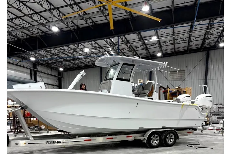The Image of 2026 Freeman 28 boat in workshop on trailer. - 0