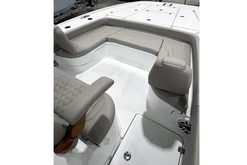 Slide: The Image of Interior of Freeman 28 boat, 2026 model, featuring cushioned seating. - 2
