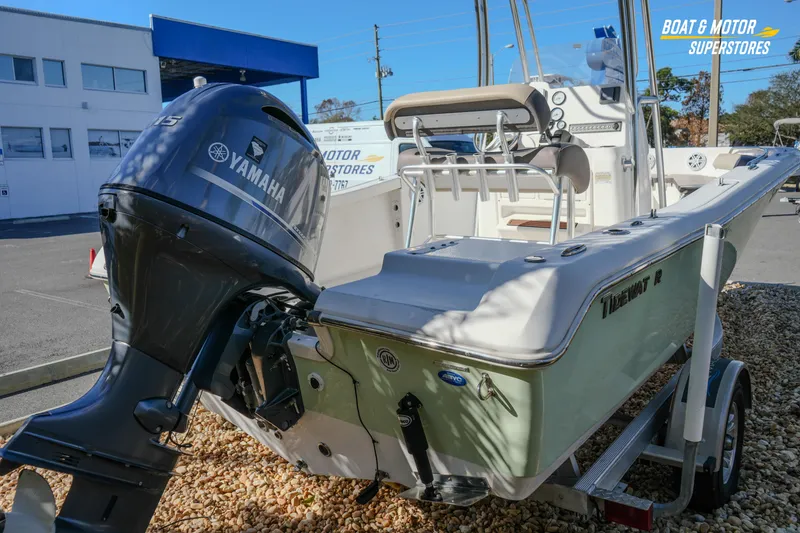 Slide: The Image of 2019 Tidewater 198 CC Adventure boat with Yamaha outboard motor at dealership. - 17
