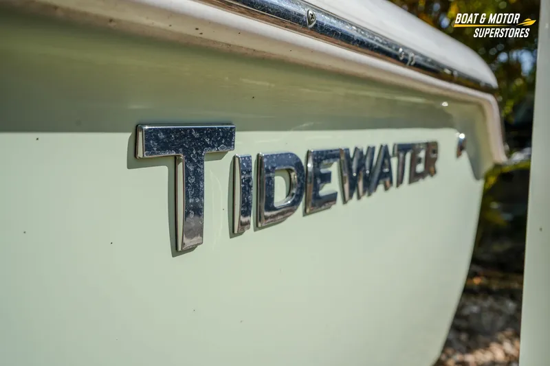 Slide: The Image of 2019 Tidewater 198 CC Adventure boat side view with logo. - 24