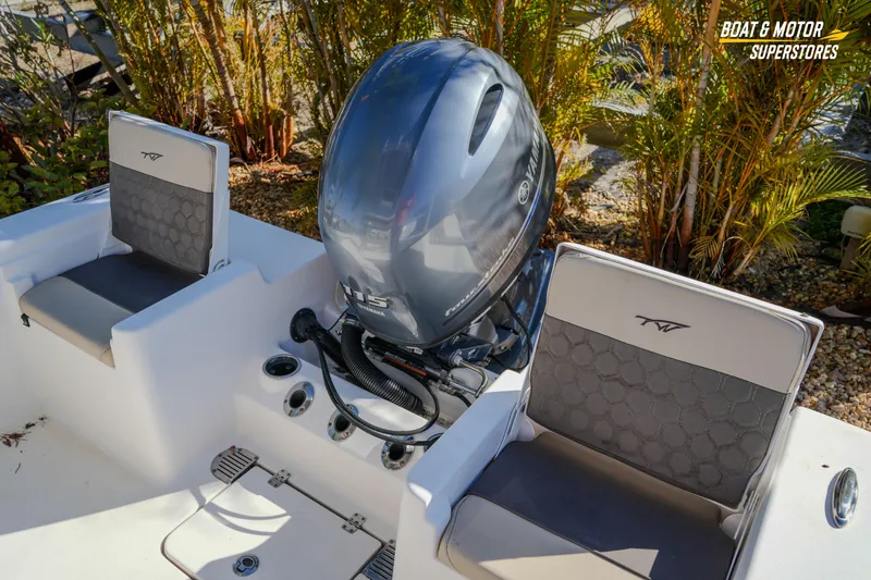 Slide: The Image of 2019 Tidewater 198 CC Adventure boat with Yamaha outboard motor, featuring comfortable seating. - 25