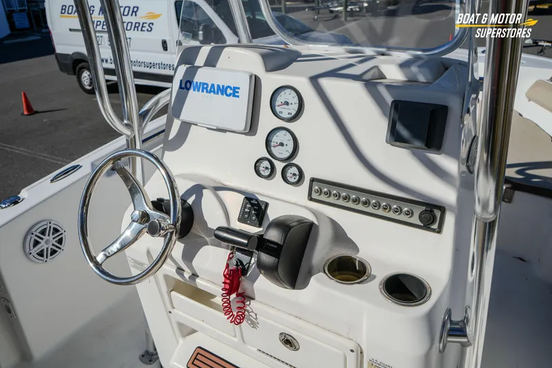 Slide: The Image of 2019 Tidewater 198 CC Adventure boat console with steering wheel and gauges. - 27