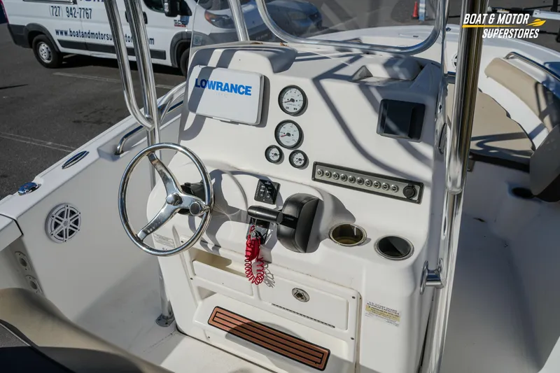 Slide: The Image of 2019 Tidewater 198 CC Adventure boat console with steering wheel and gauges. - 28