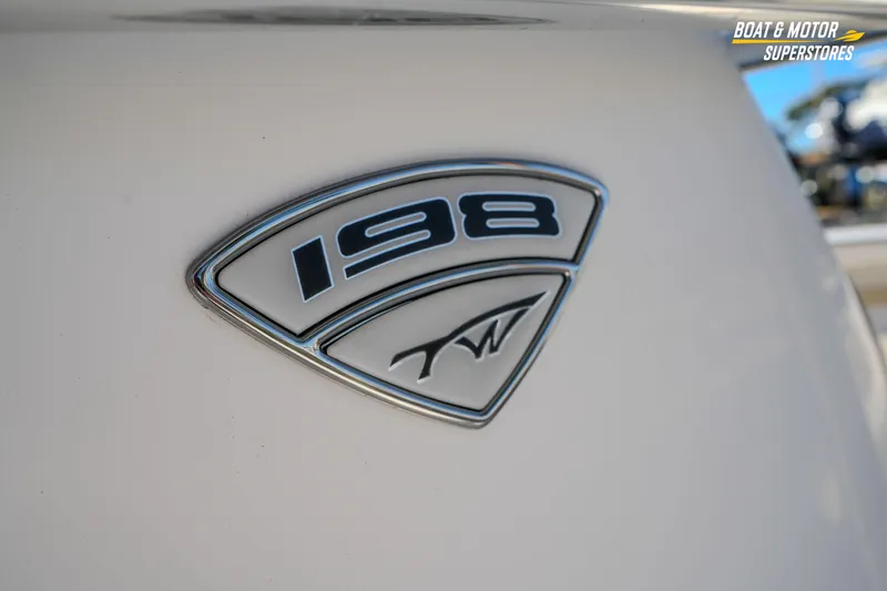 Slide: The Image of 2019 Tidewater 198 CC Adventure boat emblem close-up. - 32