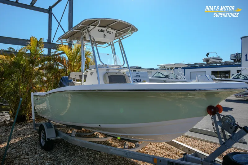Slide: The Image of 2019 Tidewater 198 CC Adventure boat on trailer at dealership. - 7