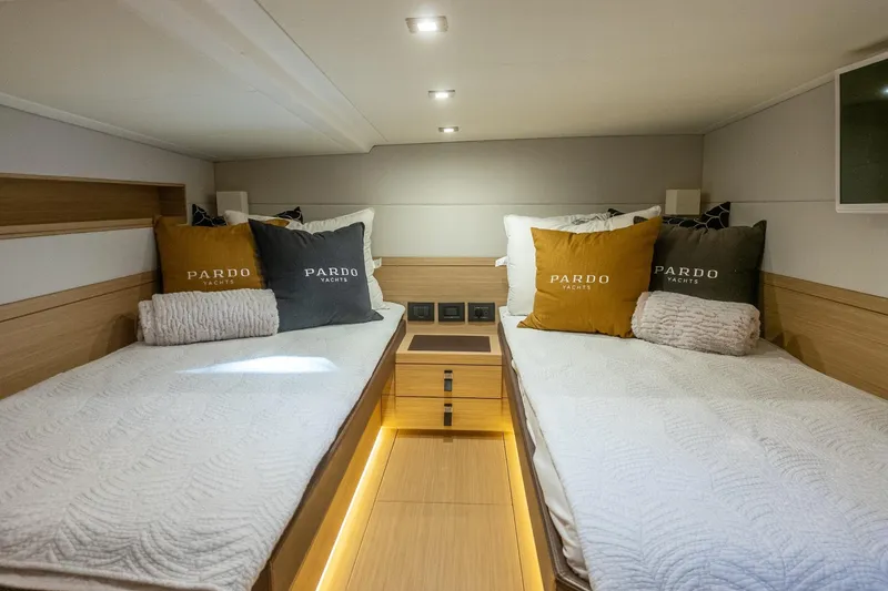 Slide: The Image of Luxurious 2019 Pardo Yachts P50 cabin with twin beds and elegant decor. - 21