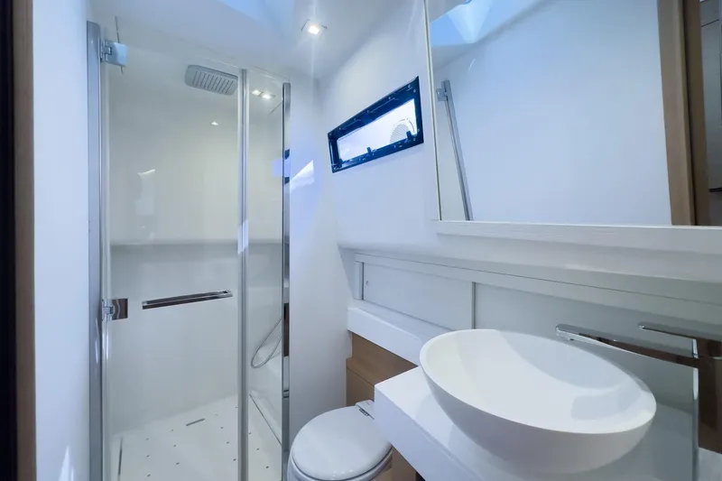 Slide: The Image of Modern bathroom interior on 2019 Pardo Yachts P50, featuring sleek shower and basin. - 25