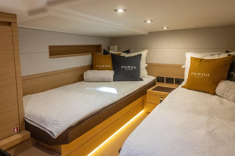 Slide: The Image of Luxurious cabin interior of 2019 Pardo Yachts P50 with cozy twin beds and elegant decor. - 22